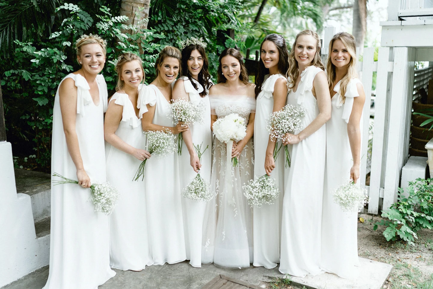 wearing a bridesmaid dress as a wedding dress Ivory Empire Waist V-neck Sleeveless Satin Bridesmaid Gown main image 0